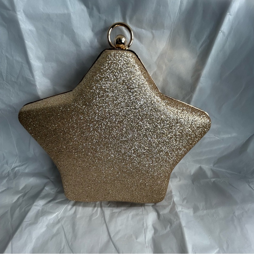 ⭐️ NWOT| Elegant Gold and Blue Glitter Star Clutch